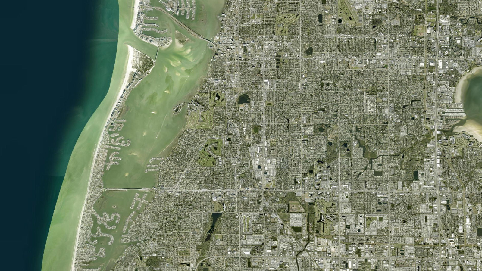 True overhead satellite view of Belleair, Florida, showing the town, Clearwater Harbor and nearby Gulf beaches