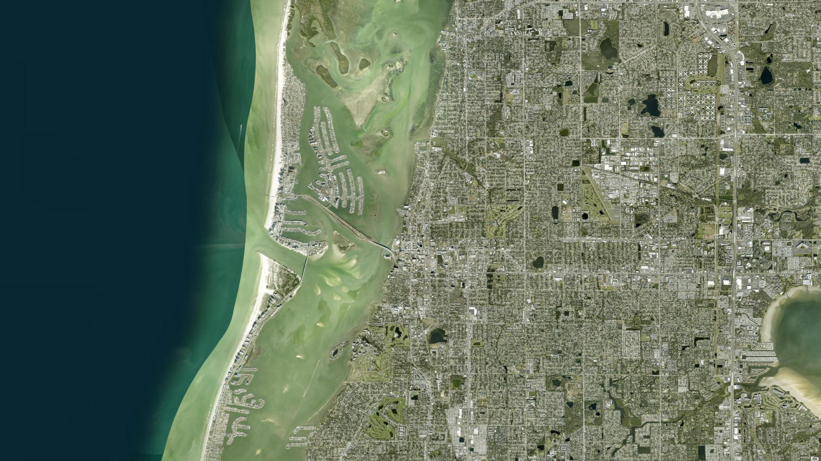 True overhead satellite view of Clearwater, Florida, from the Gulf beaches across the mainland