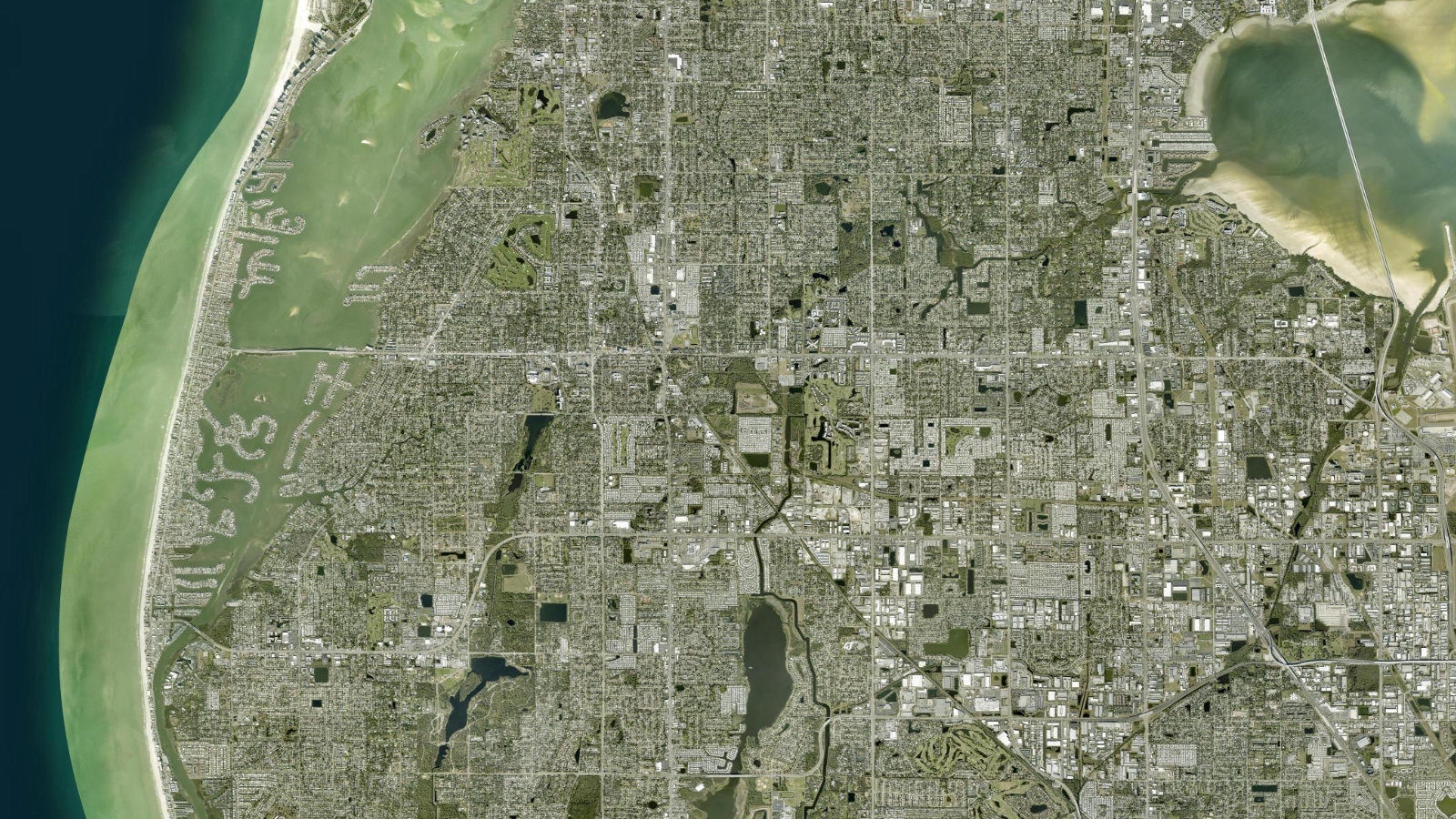 True overhead satellite view of Largo, Florida, showing central Pinellas neighborhoods and nearby Gulf waterways